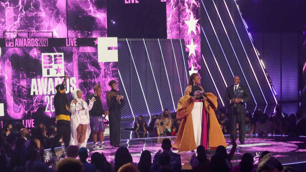 LOS ANGELES, CALIFORNIA - JUNE 27: Queen Latifah (2nd from R) accepts the Lifetime Achievement BET Award onstage at the BET Awards 2021 at Microsoft Theater on June 27, 2021 in Los Angeles, California. (Photo by Johnny Nunez/Getty Images for BET)